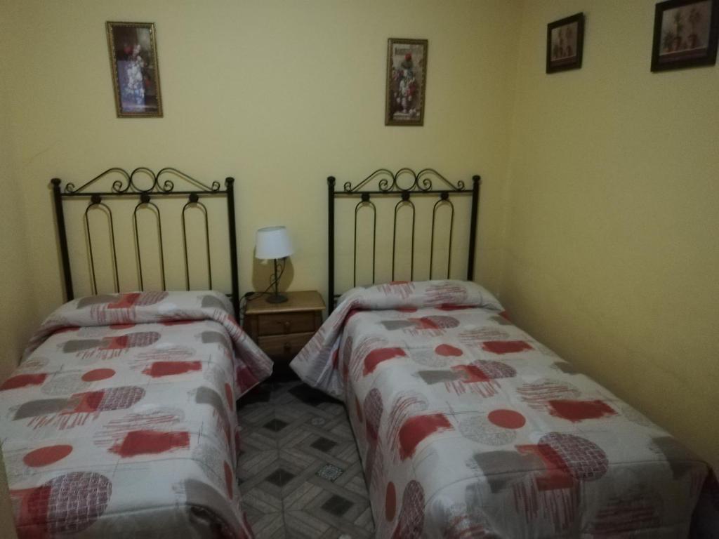 Postel nebo postele na pokoji v ubytování Alojamientos Rurales Vado Ancho La Encina