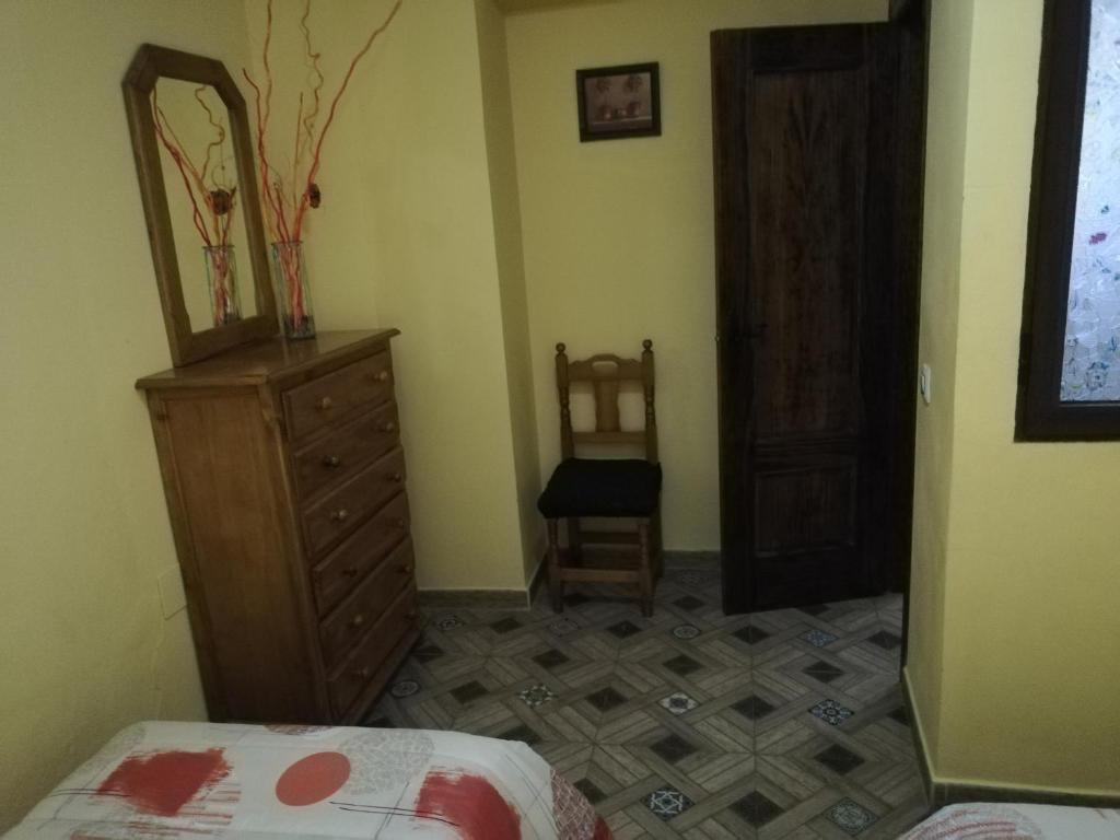 Postel nebo postele na pokoji v ubytování Alojamientos Rurales Vado Ancho La Encina
