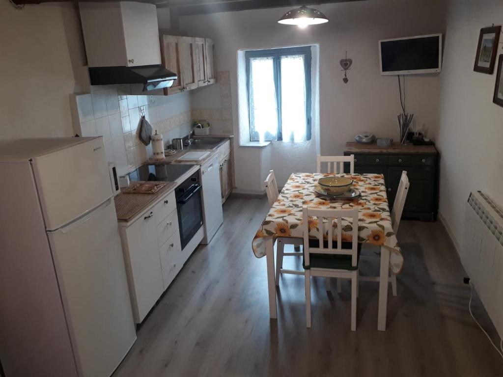 Kuchyň nebo kuchyňský kout v ubytování Agriturismo Nonnamelia