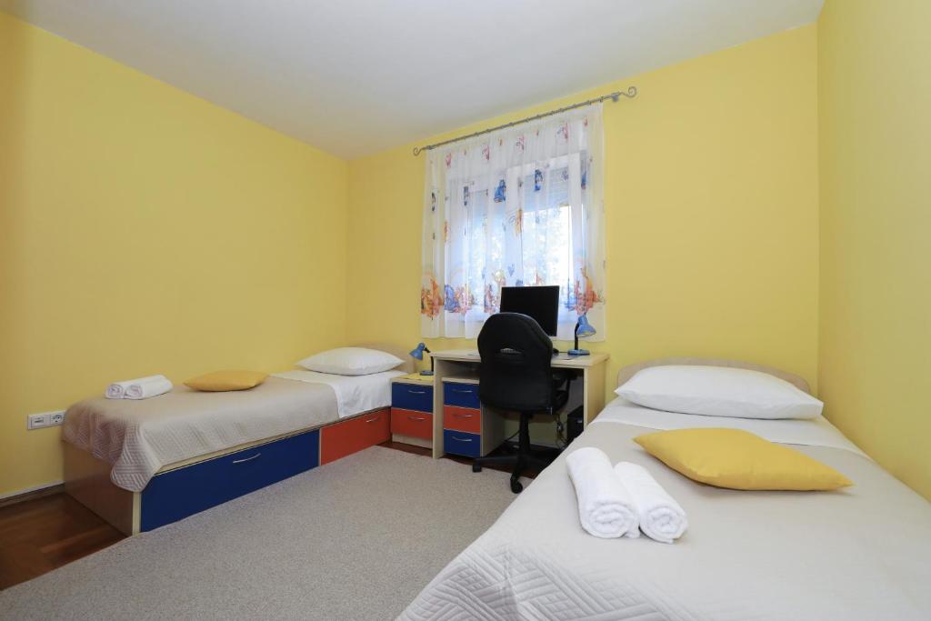 Posteľ alebo postele v izbe v ubytovaní Apartment Toni Zadar