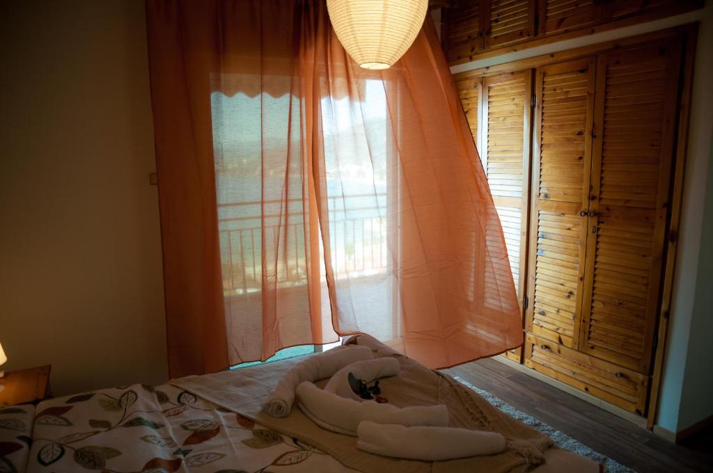 Posteľ alebo postele v izbe v ubytovaní Paradise View Apartment