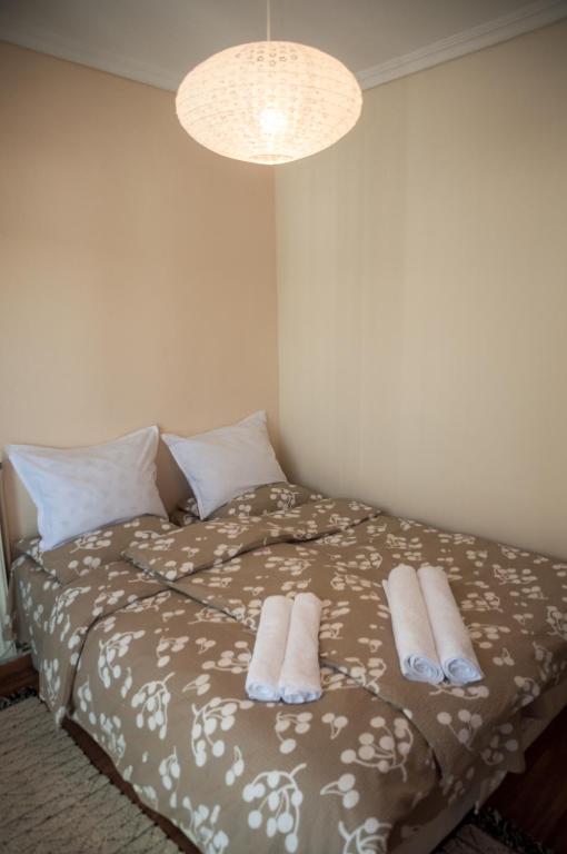 Posteľ alebo postele v izbe v ubytovaní Paradise View Apartment