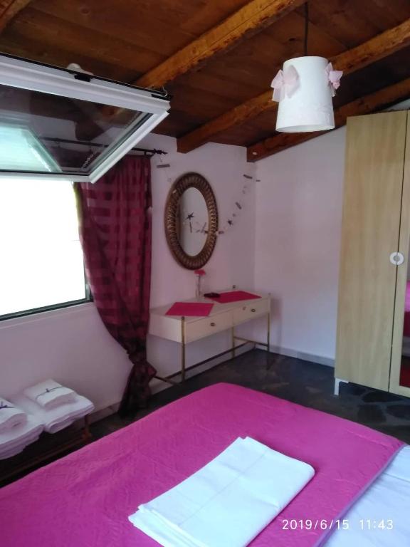Postel nebo postele na pokoji v ubytování Sevi Platamon Home