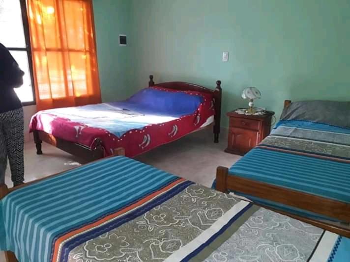 Postel nebo postele na pokoji v ubytování Hostel Odorico