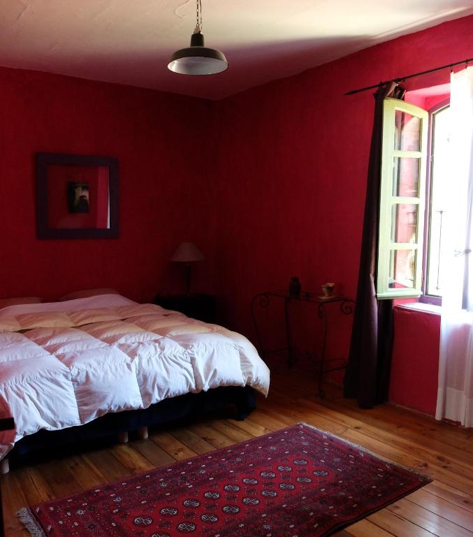 Postel nebo postele na pokoji v ubytování Maison d'Almes