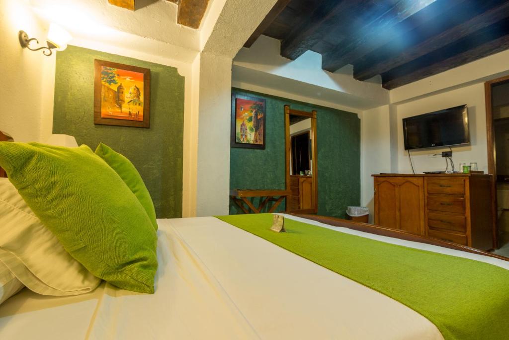 TV a/nebo společenská místnost v ubytování Hotel Don Pedro De Heredia
