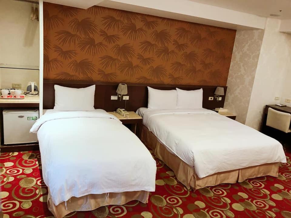 Postel nebo postele na pokoji v ubytování Say Love Hotel