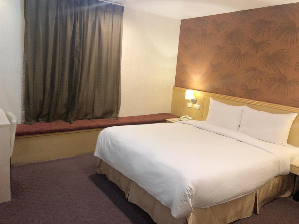 Postel nebo postele na pokoji v ubytování Say Love Hotel