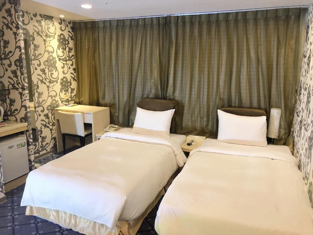 Postel nebo postele na pokoji v ubytování Say Love Hotel