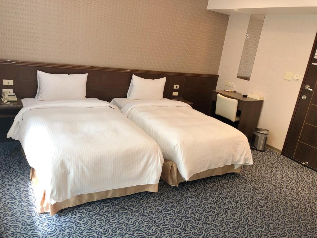 Postel nebo postele na pokoji v ubytování Say Love Hotel