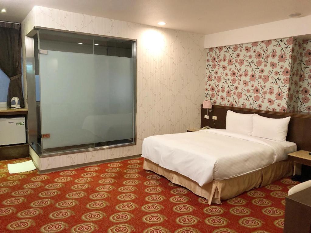 Postel nebo postele na pokoji v ubytování Say Love Hotel