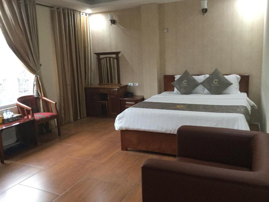 Postel nebo postele na pokoji v ubytování Chio Hotel