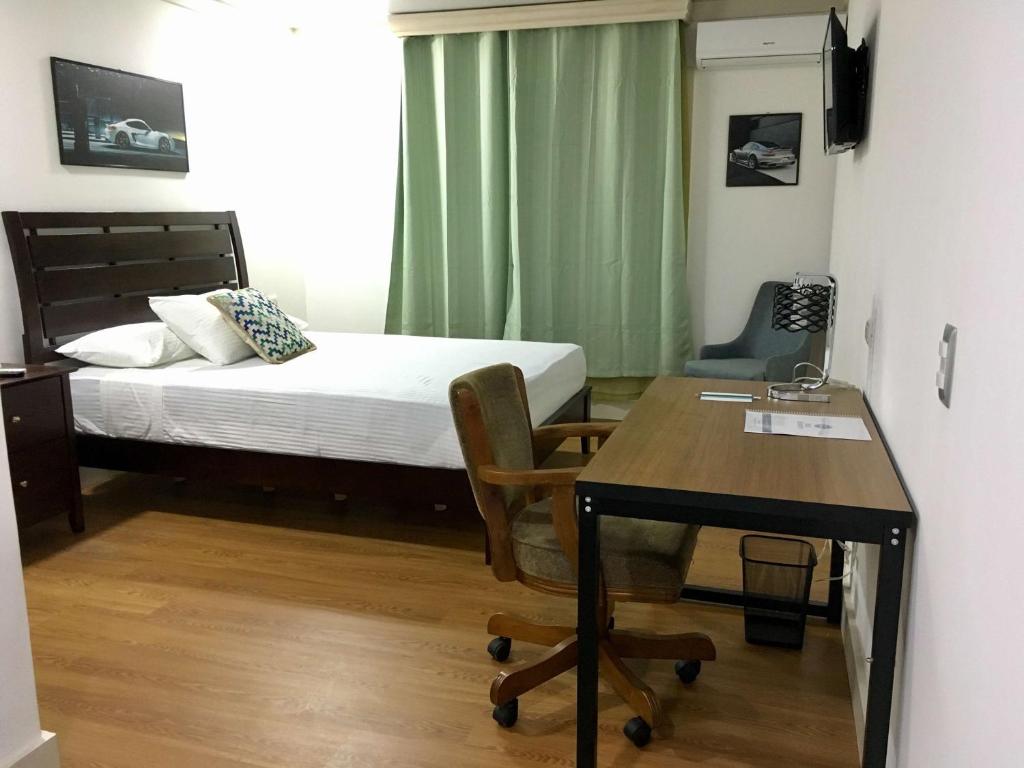 Postel nebo postele na pokoji v ubytování Hotel Zima