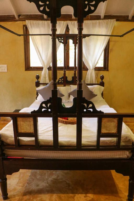 Postel nebo postele na pokoji v ubytování Namaste Jungle - A Boutique Homestay
