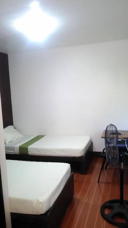 Postel nebo postele na pokoji v ubytování Lipa Bed & Breakfast