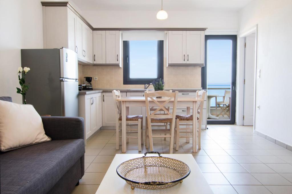 Kuchyň nebo kuchyňský kout v ubytování Kimata Apartments