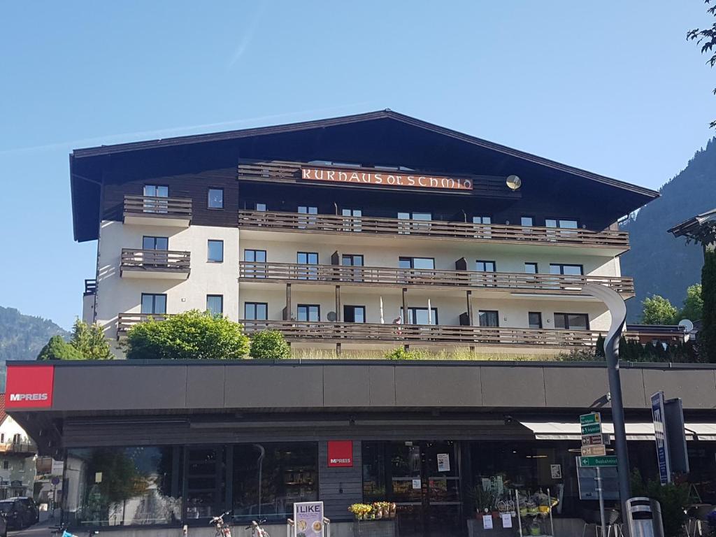 a large building with a sign on top of it at Rooftop Apartment in Bad Hofgastein