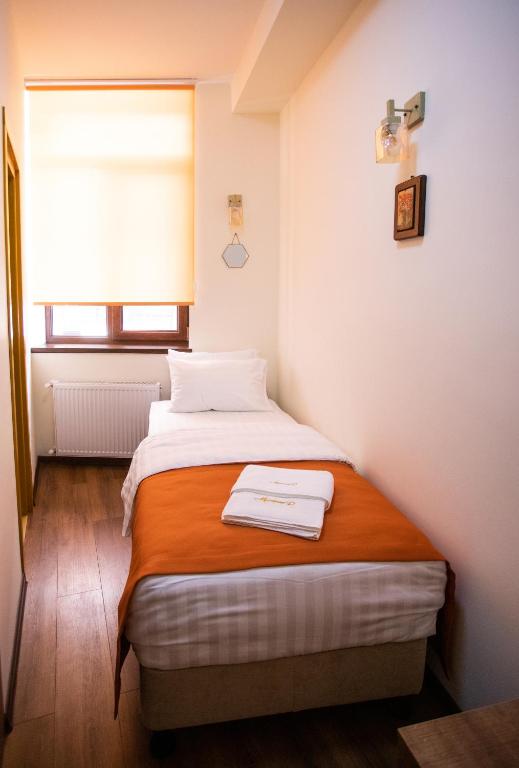Postel nebo postele na pokoji v ubytování Mariam R