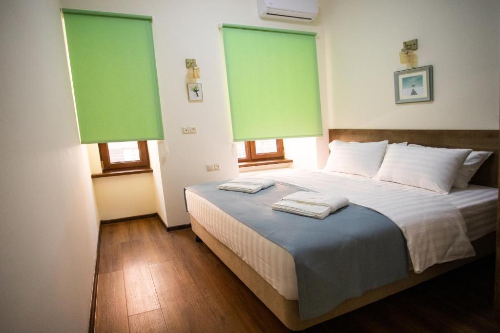Postel nebo postele na pokoji v ubytování Mariam R