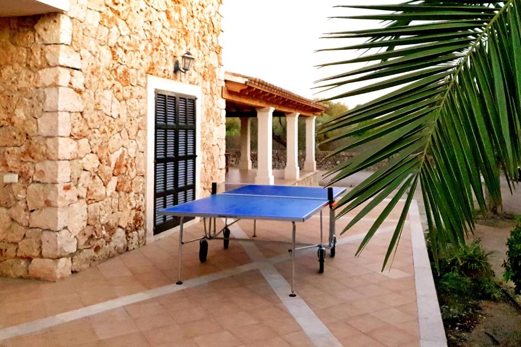 Stolní tenis v ubytování Finca Isabel y Guillermo con posibilidad de piscina climatizada nebo okolí