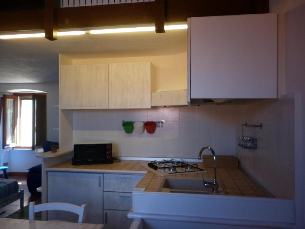 Kuchyň nebo kuchyňský kout v ubytování Maisonette Tommy