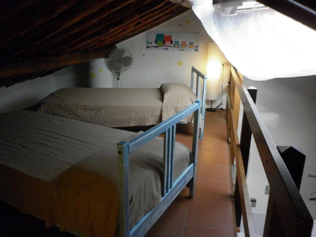 Postel nebo postele na pokoji v ubytování Maisonette Tommy