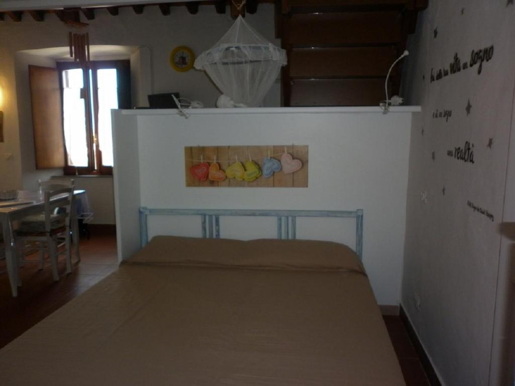 Postel nebo postele na pokoji v ubytování Maisonette Tommy