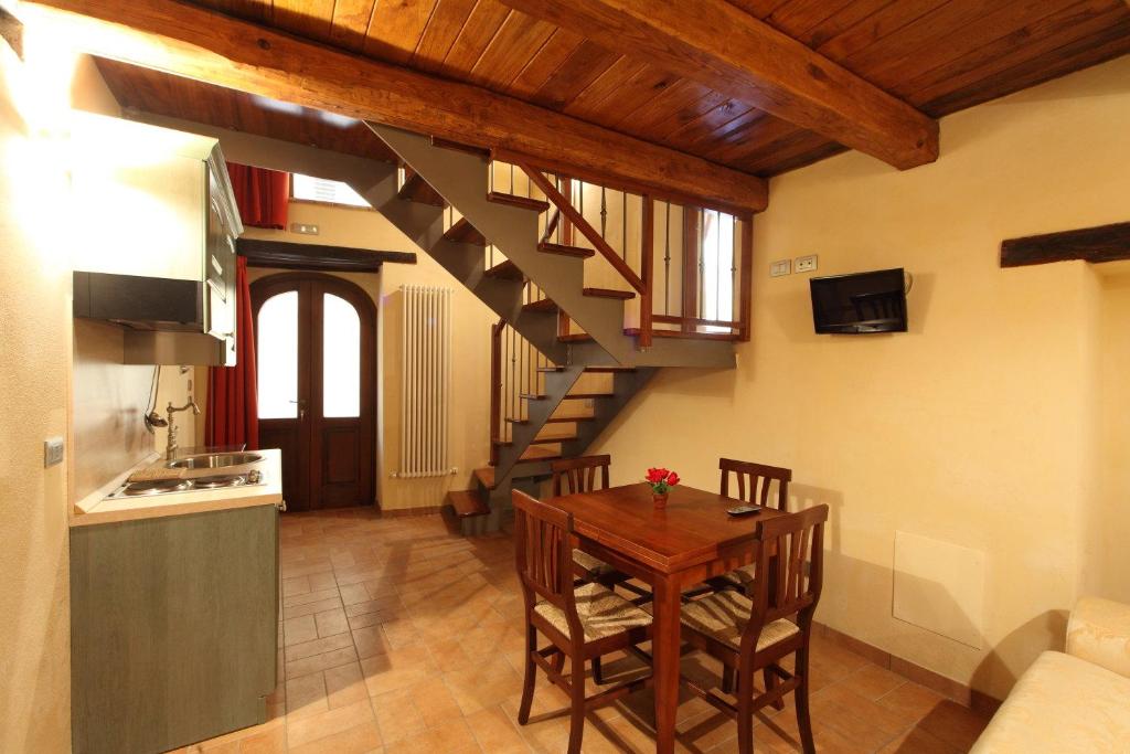 TV a/nebo společenská místnost v ubytování Residence Borgo Da Mare