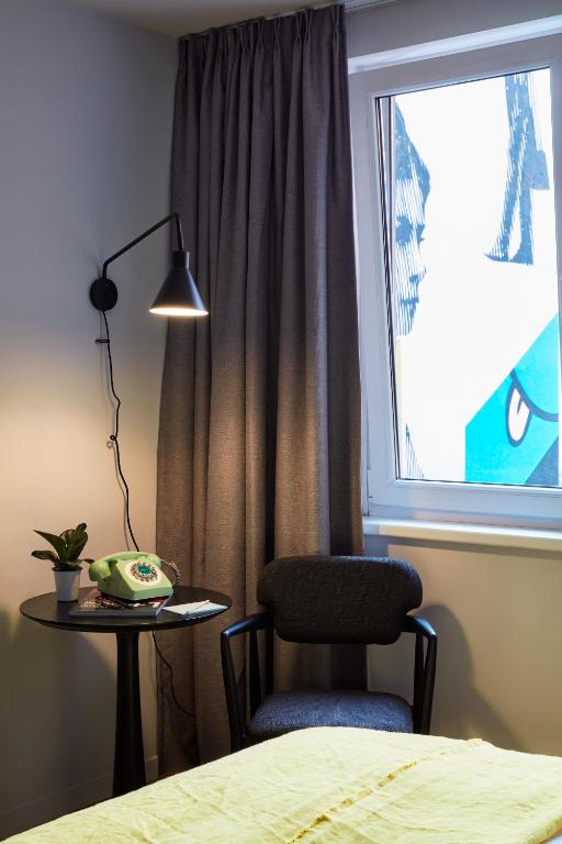 Ein Bett oder Betten in einem Zimmer der Unterkunft Max Brown Hotel 7th District, part of Sircle Collection