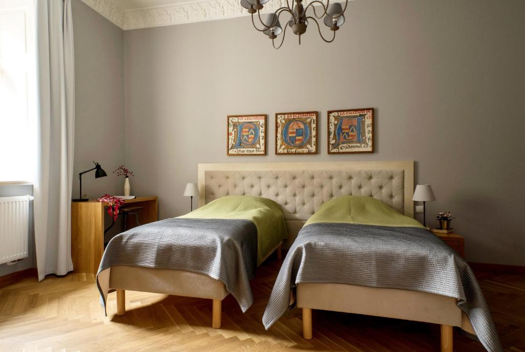 Posteľ alebo postele v izbe v ubytovaní Belle Epoque Residence