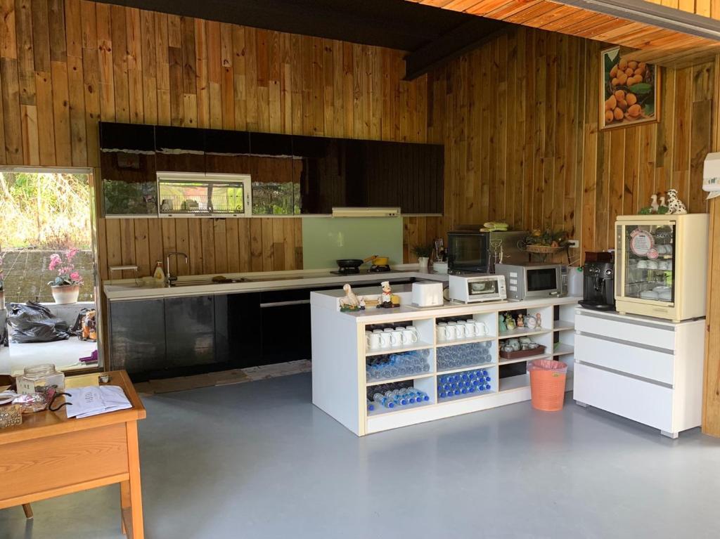 Kuchyň nebo kuchyňský kout v ubytování Taomi 5211 B&B