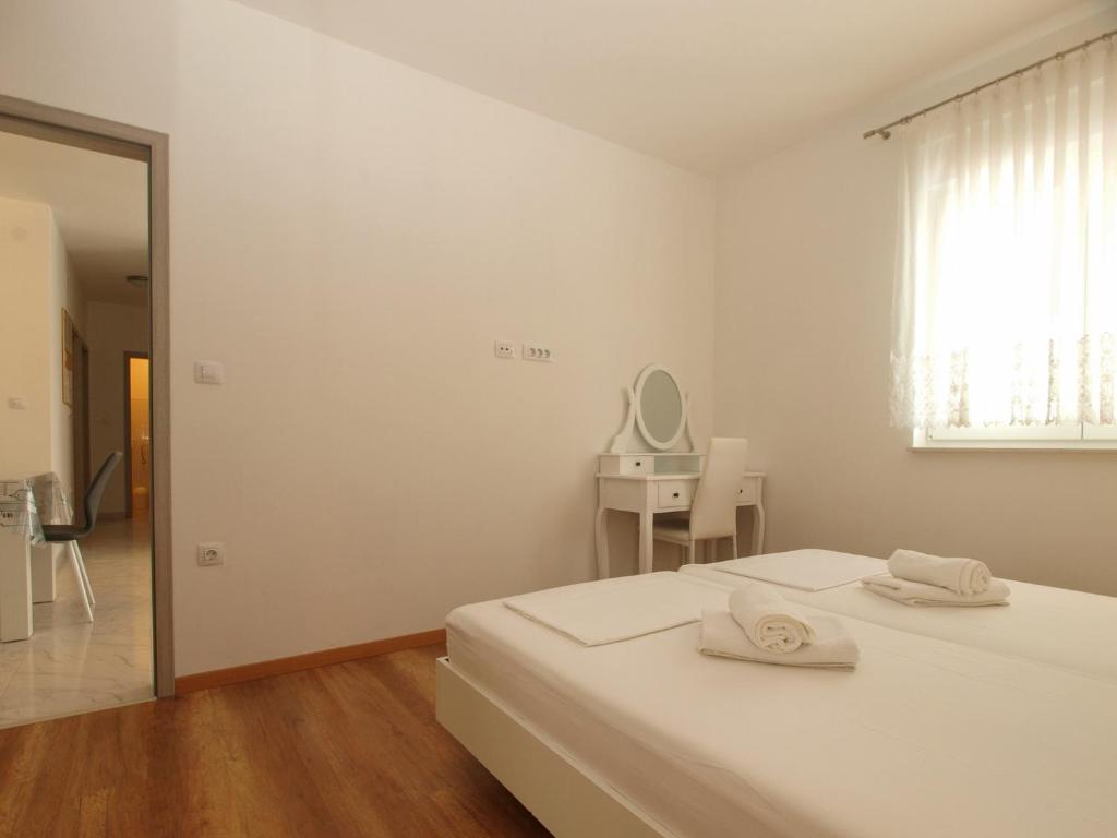 Krevet ili kreveti u jedinici u objektu 4 Stars Apartments-Pikula