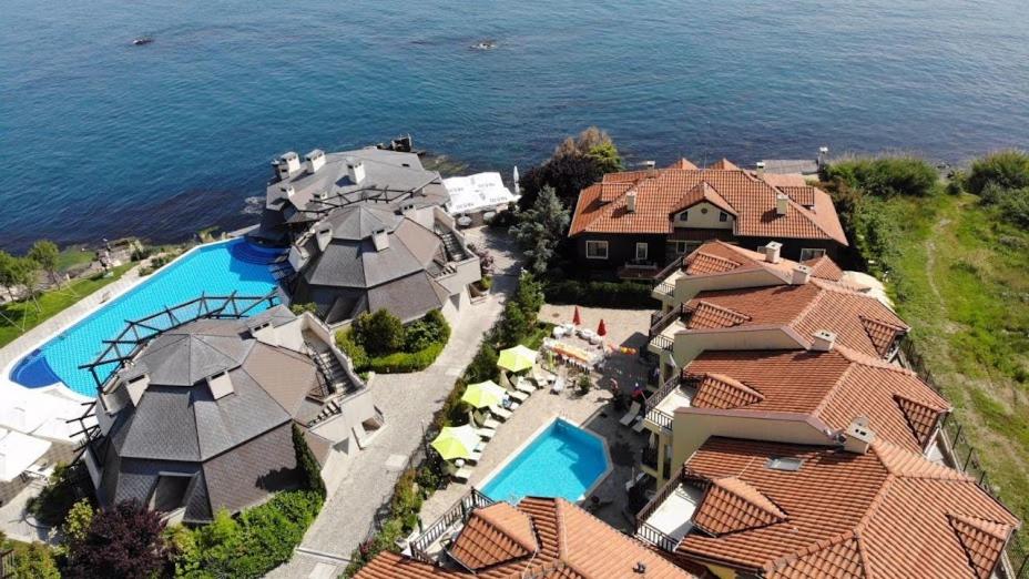 an aerial view of a house with a swimming pool at Apartments Elinor Budjaka in Sozopol