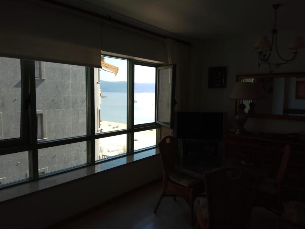 A television and/or entertainment centre at Apartamento A Peregrina (Silgar, Sanxenxo)