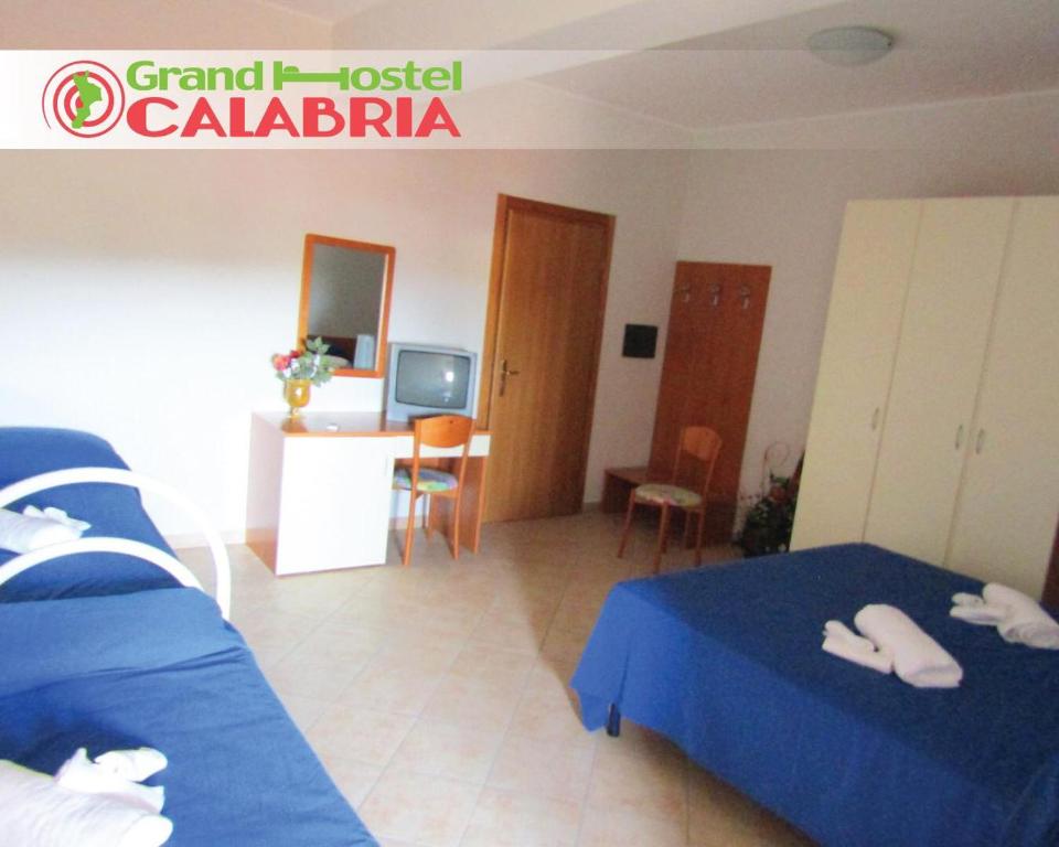 Posteľ alebo postele v izbe v ubytovaní Grand Hostel Calabria
