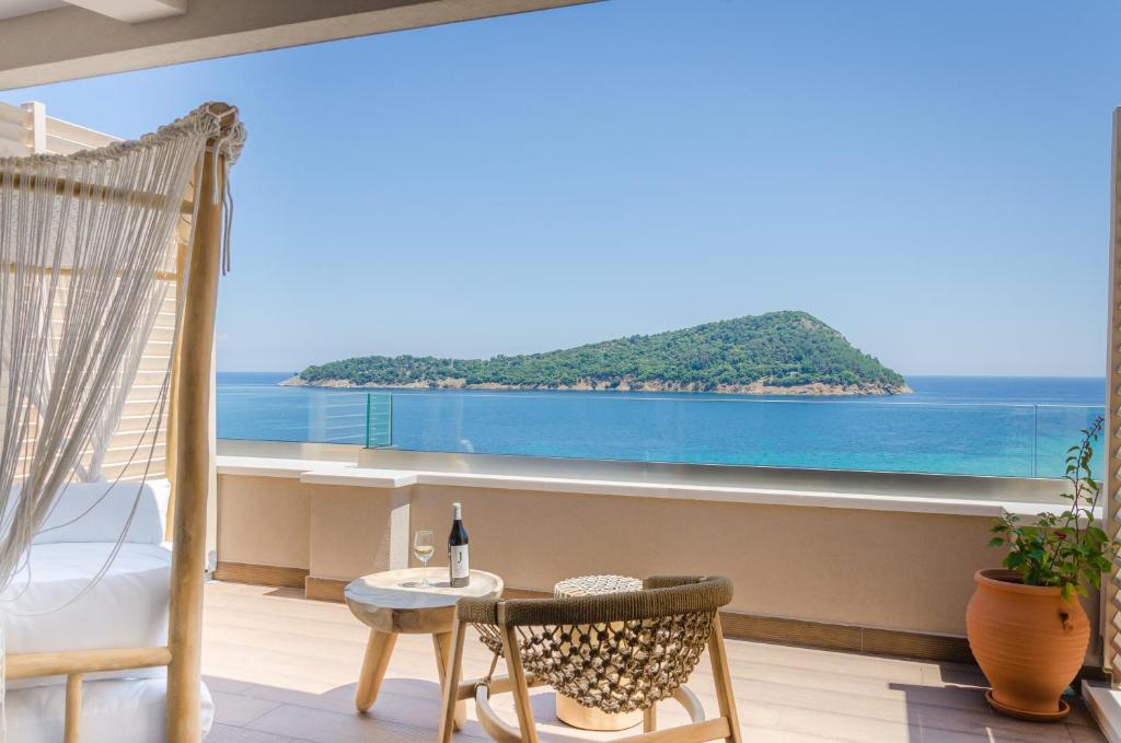 a room with a view of the ocean at Agorastos Hotel in Koinyra