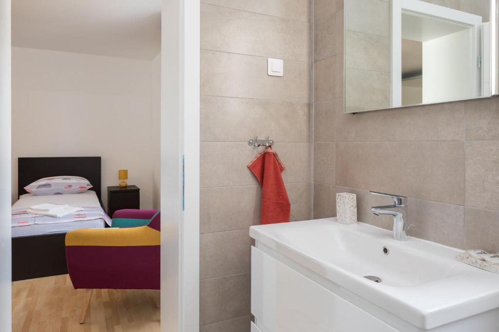 Posteľ alebo postele v izbe v ubytovaní Absolute Beach Villa