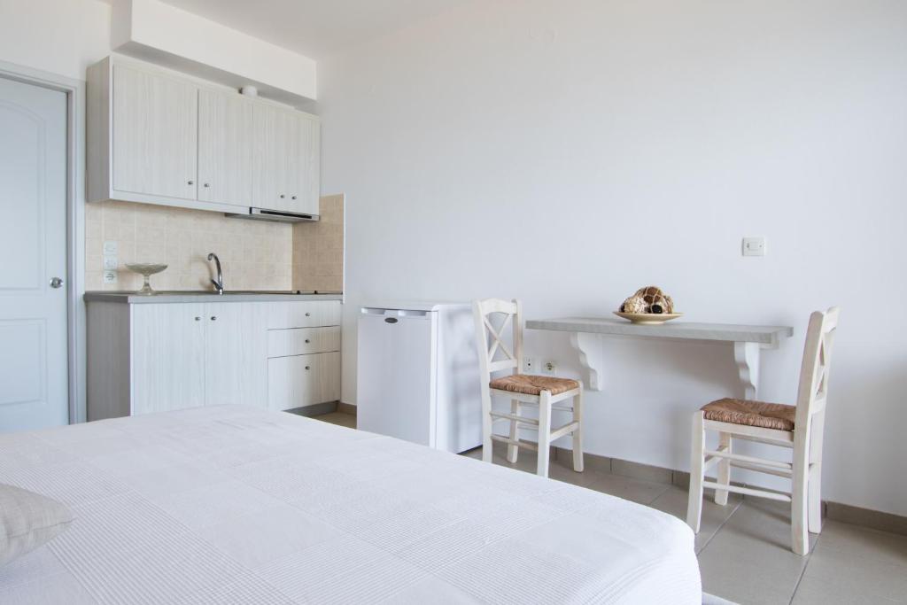 Kuchyň nebo kuchyňský kout v ubytování Kimata Apartments