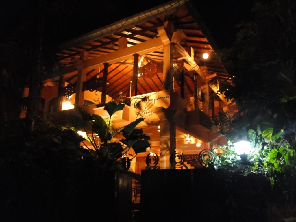 a house at night with lights on it at Thambapanni Retreat in Unawatuna