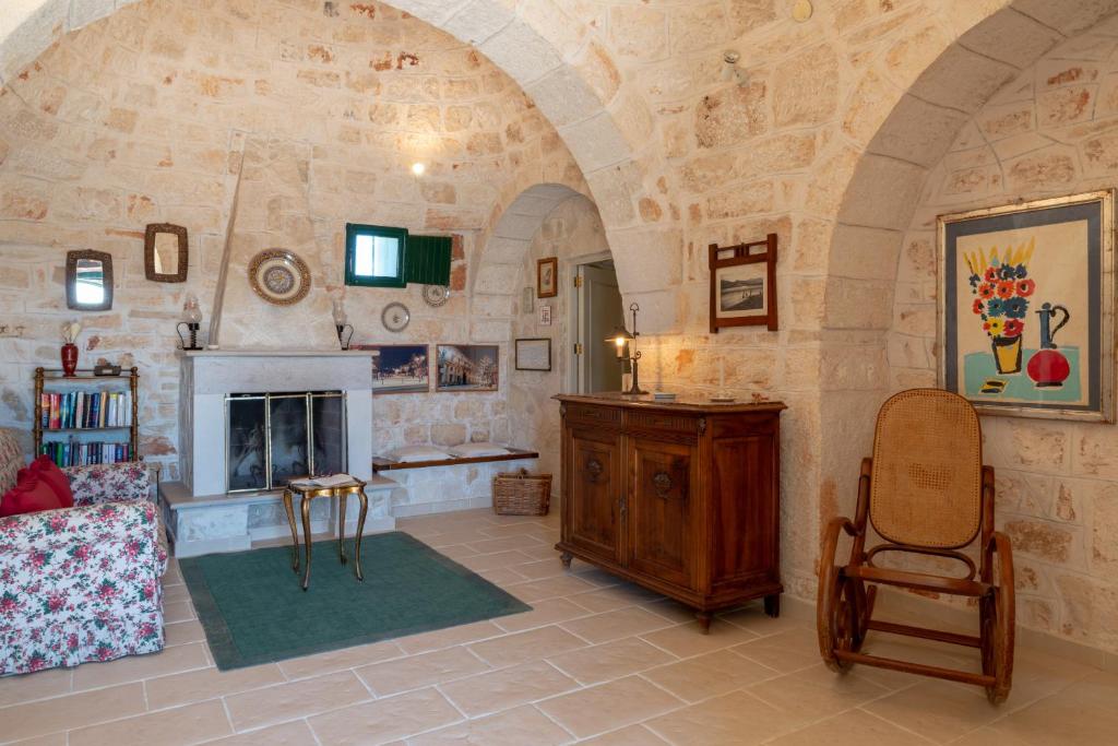 Posedenie v ubytovaní Stile e relax nei trulli by Wonderful Italy
