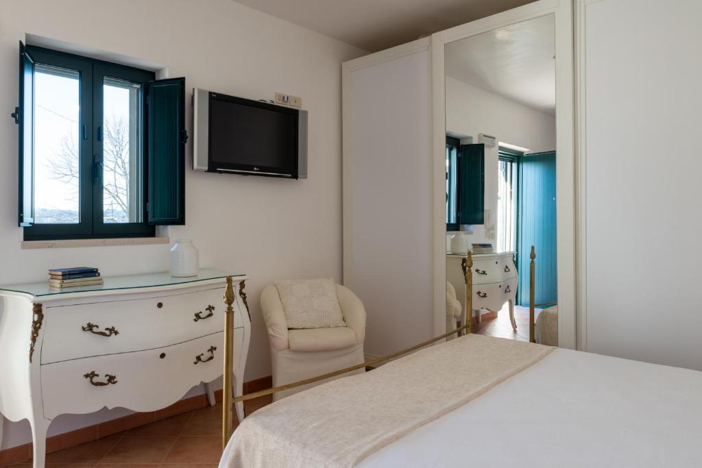 Posteľ alebo postele v izbe v ubytovaní Stile e relax nei trulli by Wonderful Italy