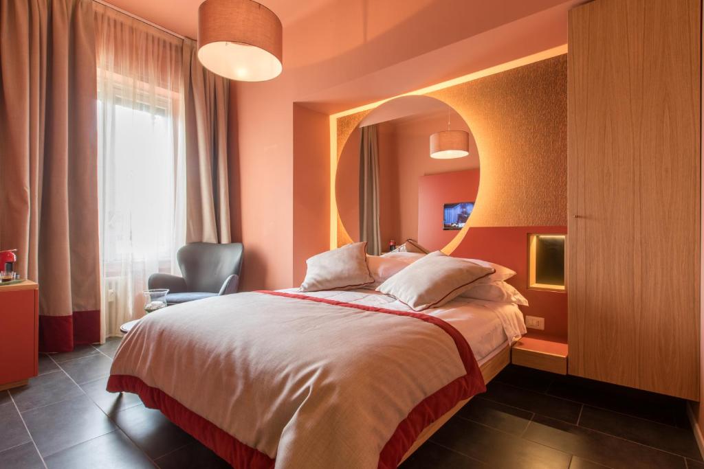 Кровать или кровати в номере Le Texture Premium Rooms Duomo-Cordusio