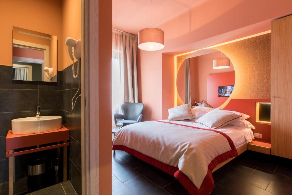 Кровать или кровати в номере Le Texture Premium Rooms Duomo-Cordusio