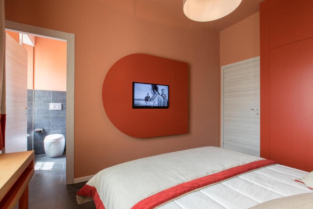 Кровать или кровати в номере Le Texture Premium Rooms Duomo-Cordusio