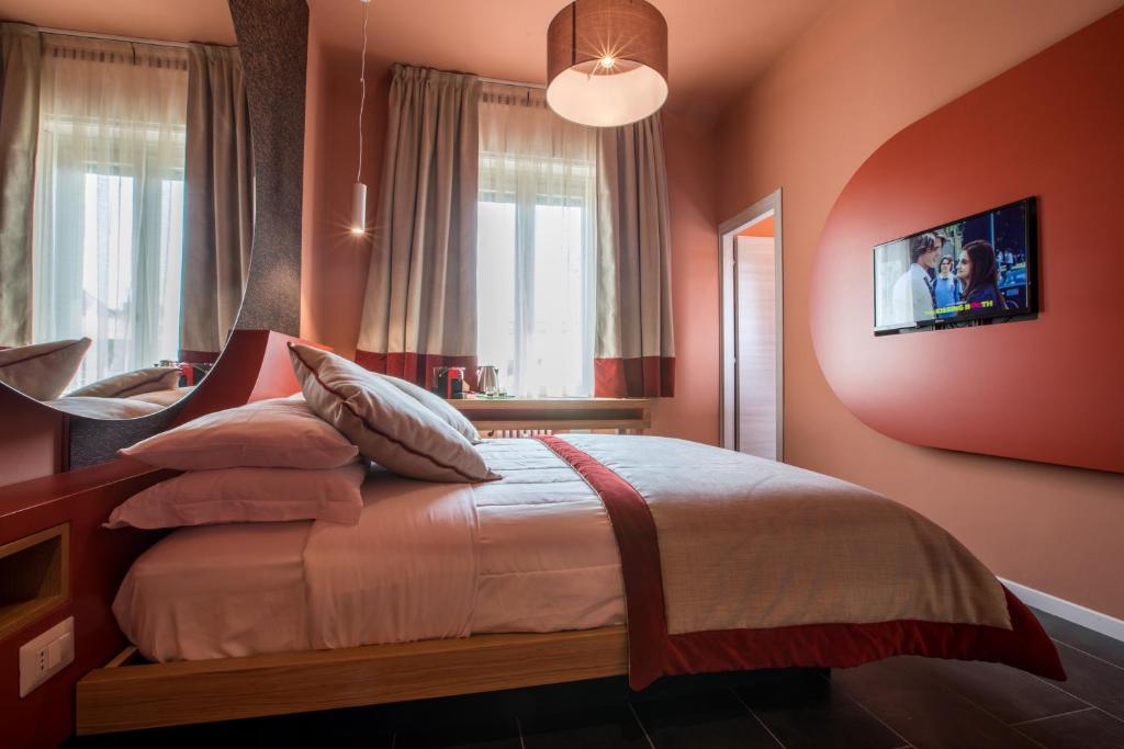 Кровать или кровати в номере Le Texture Premium Rooms Duomo-Cordusio