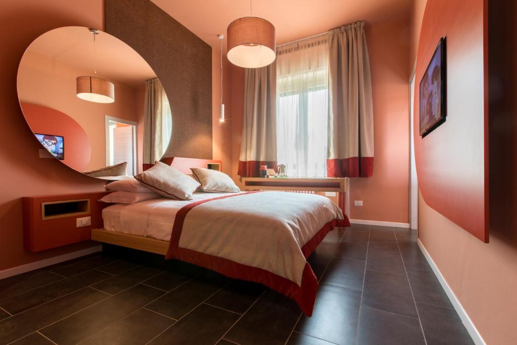 Кровать или кровати в номере Le Texture Premium Rooms Duomo-Cordusio