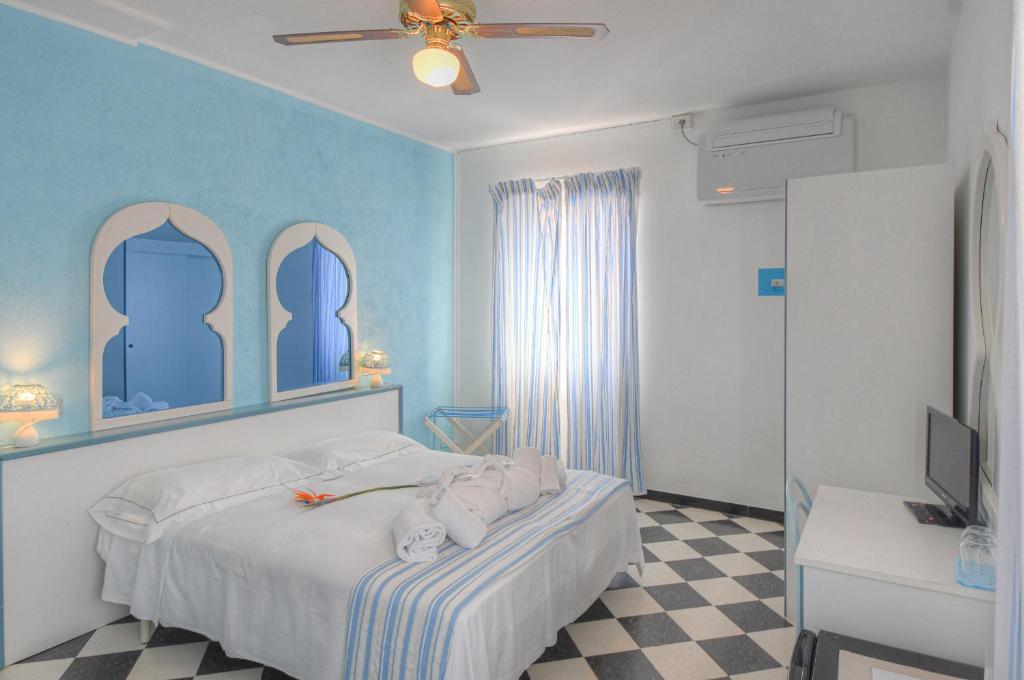 Posteľ alebo postele v izbe v ubytovaní Hotel Arabesque
