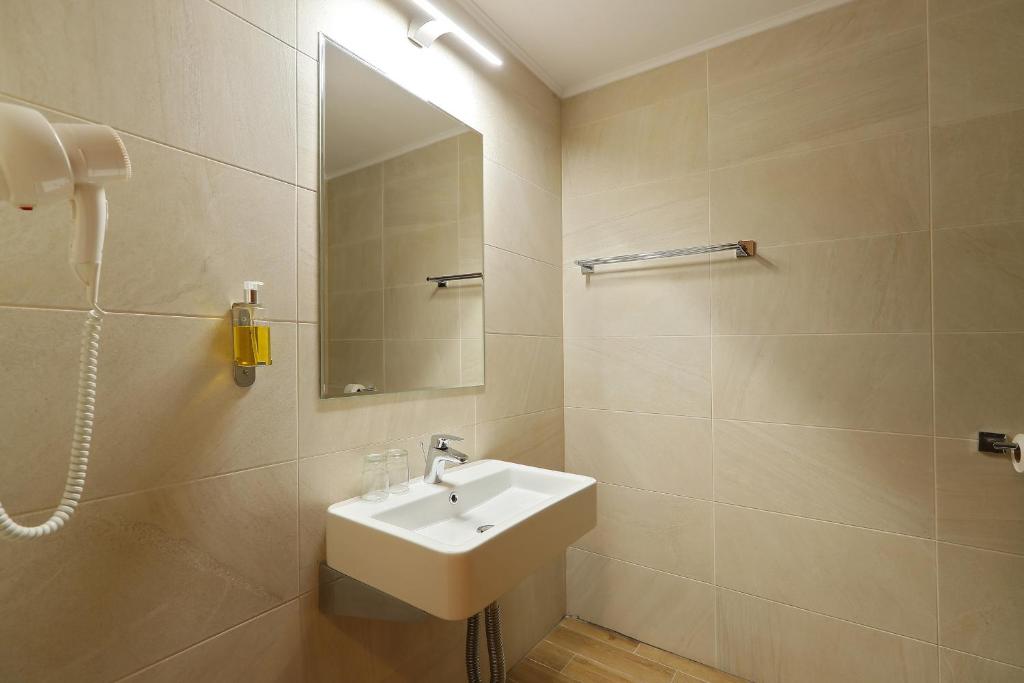 Koupelna v ubytování Hotel Impero