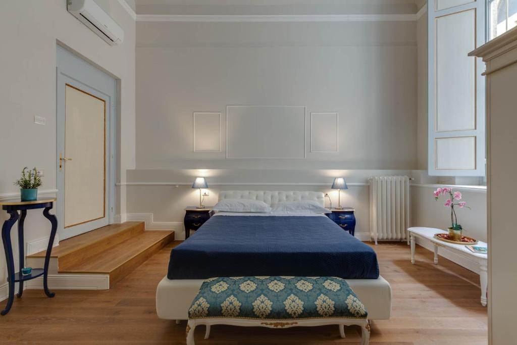 A bed or beds in a room at Residenza d'Epoca Sant Egidio