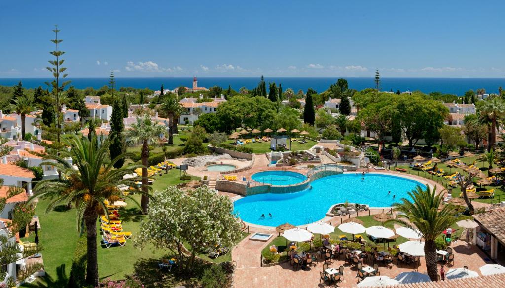 an aerial view of a resort with a swimming pool at Rocha Brava Village Resort in Carvoeiro